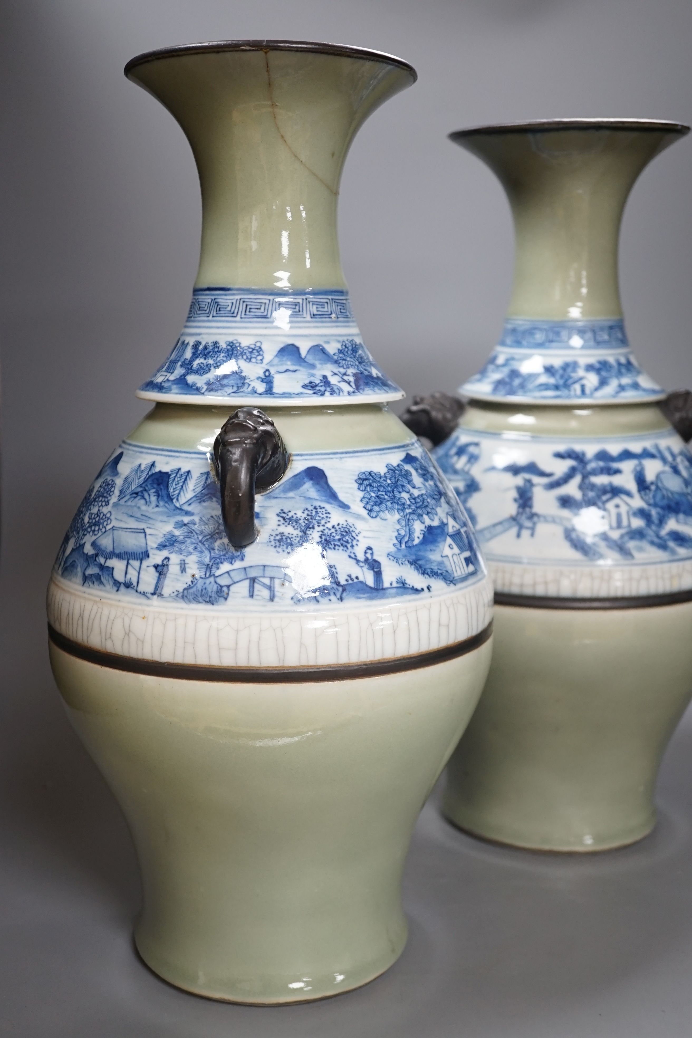 A pair of Chinese celadon ground underglaze blue vases, early 20th century-44cm high.